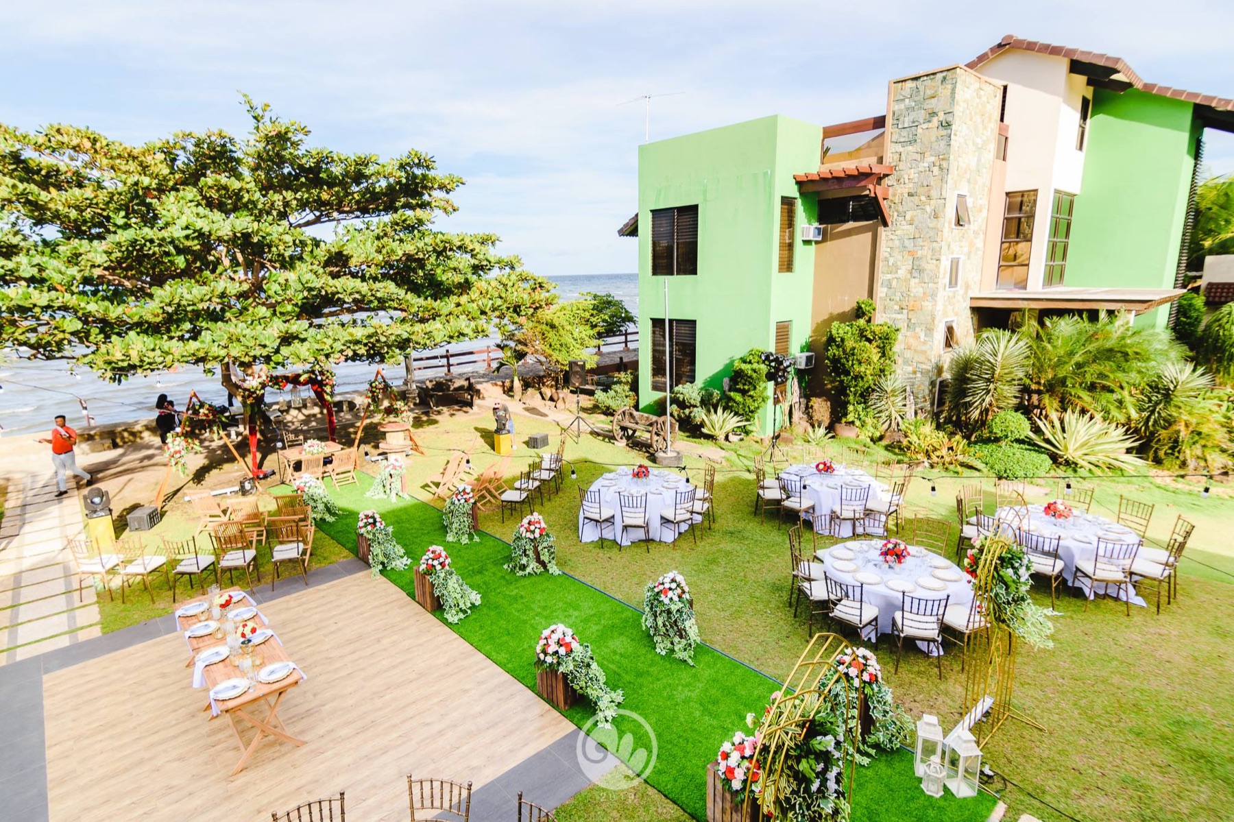 Elevated view of Praia's lawn prepared for a celebration
